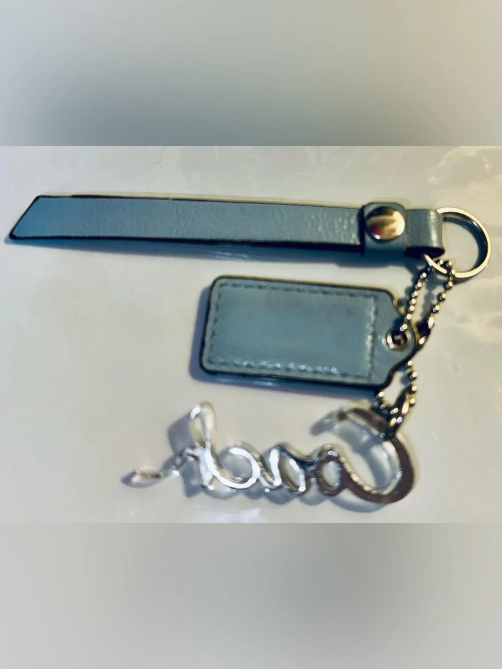 Coach Periwinkle Blue Leather Hangtag, Coach Poppy Script, Tassle, Silver - EUC